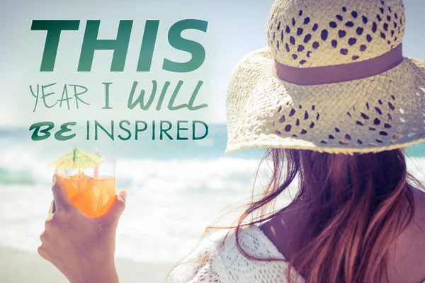 Brunette in straw hat holding cocktail — Stock Photo, Image