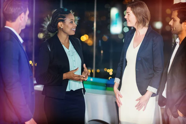 Group of businesspeople interacting with each other — Stock Photo, Image