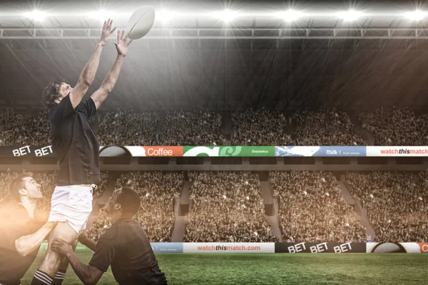 Rugby-Spieler springen um die Wette — Stockfoto