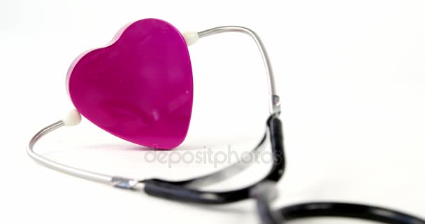 Toy heart with stethoscope — Stock Video