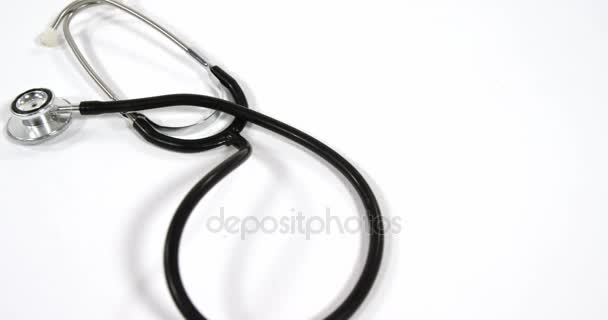 Stethoscope on a white background — Stock Video
