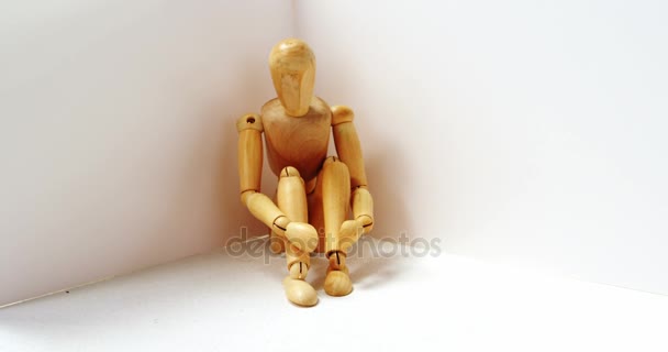 Figurine in sad pose — Stock Video