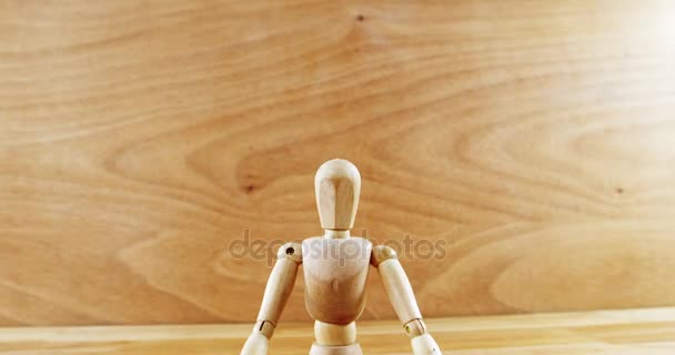 Figurine performing yoga — Stock Video