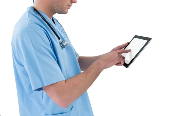 Surgeon using futuristic digital tablet — Stock Photo, Image