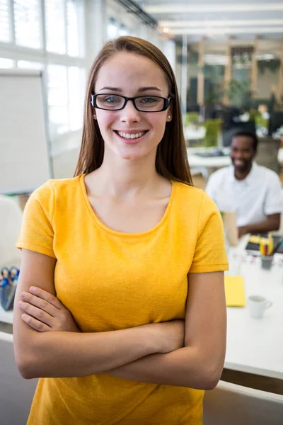 Graphic designer standing with arms crossed — Stock Photo, Image