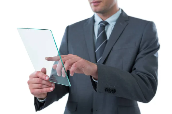 Businessman using futuristic digital tablet — Stock Photo, Image