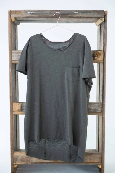 Grey t-shirt with pocket hanging — Stock Photo, Image