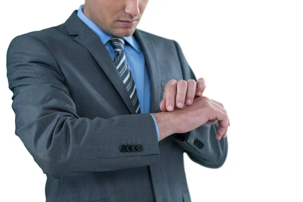 Empresario fingiendo comprobar el reloj de pulsera — Foto de Stock