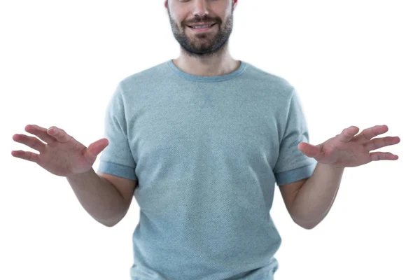 Man pretending to touch an invisible object — Stock Photo, Image