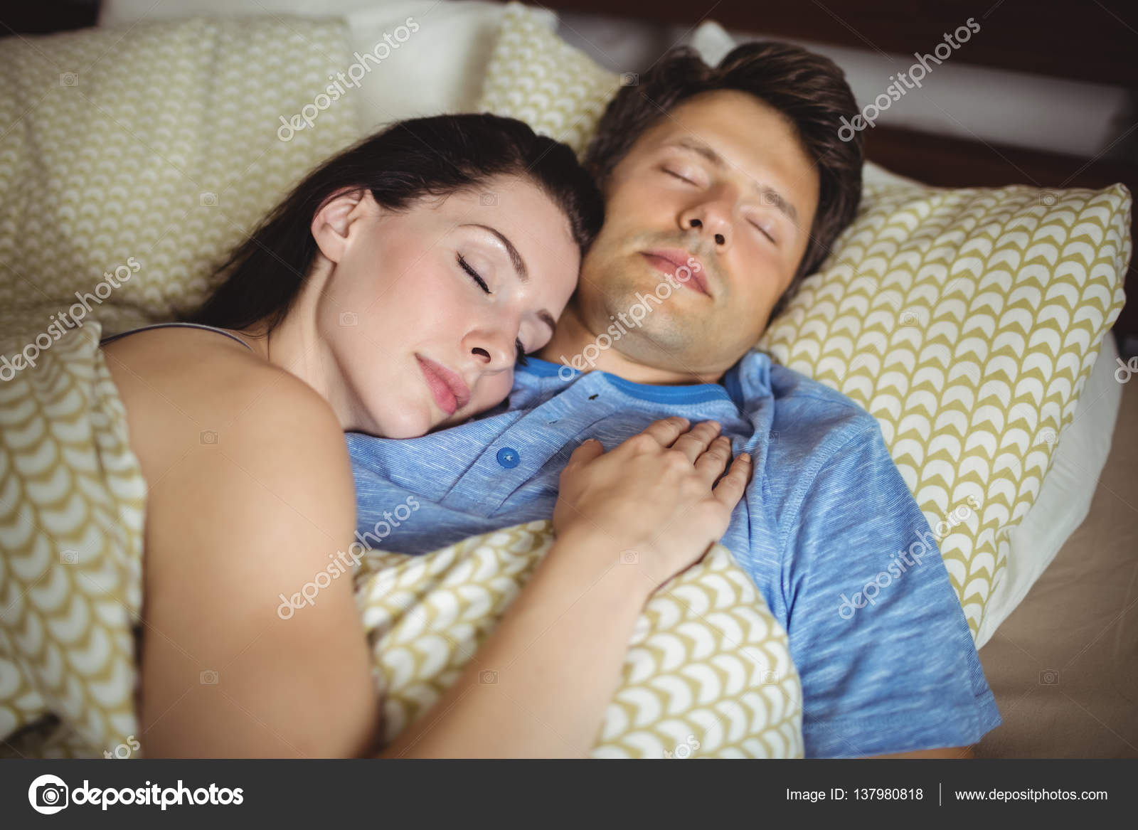 Romantic Couple Sleeping On Bed Stock Photo C Wavebreakmedia