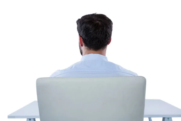 Üzletember ül egy széken — Stock Fotó