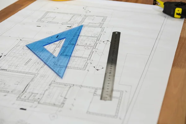 Blueprint with ruler on table — Stock Photo, Image