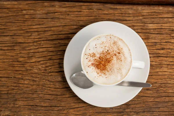 Xícara de café expresso na mesa de madeira — Fotografia de Stock