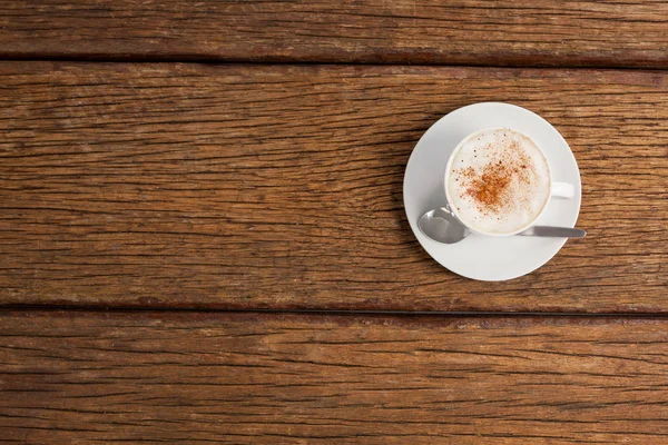 Cup of espresso coffee on wooden table — Stock Photo, Image