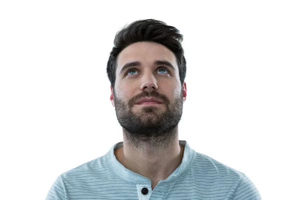 Handsome man smiling and looking up — Stock Photo, Image