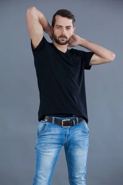 Handsome man in black t-shirt — Stock Photo, Image