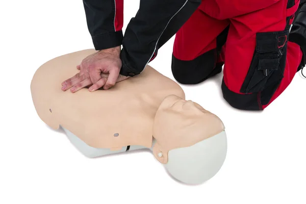 Paramedic practising resuscitation on dummy — Stock Photo, Image