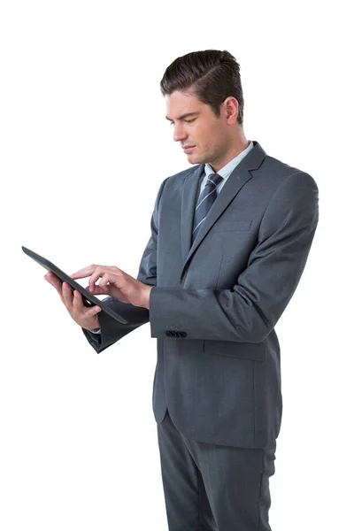 Affärsman med hjälp av en digital tablet — Stockfoto