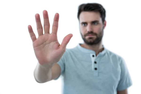Man pretending to touch an invisible screen — Stock Photo, Image