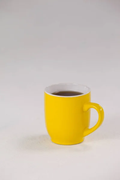 Gelbe Kaffeetasse — Stockfoto