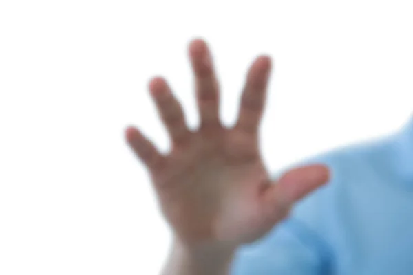 Hand of man pretending to touch an invisible screen — Stock Photo, Image