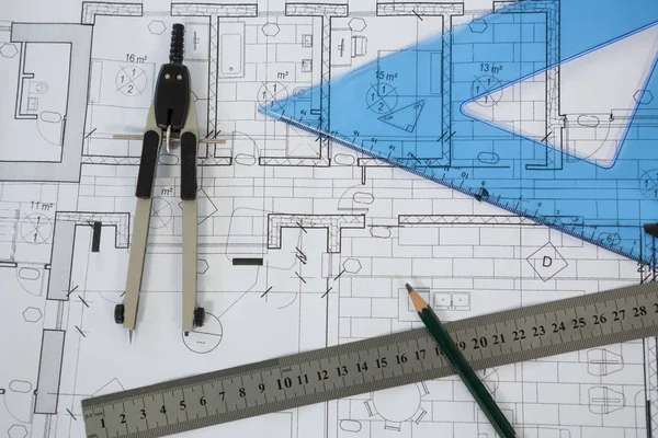 Blueprint with ruler, pencil and thumbscrew compasses — Stock Photo, Image