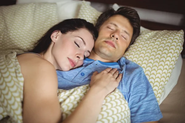 Romantic couple sleeping on bed — Stock Photo, Image