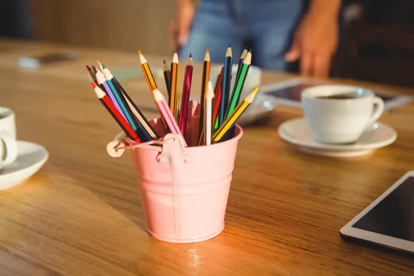 Colored pencils in a pencil holder — Stock Photo, Image