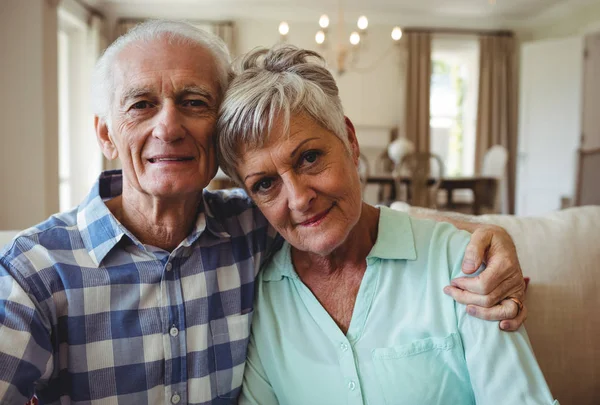 Senior couple relaxing on sofa — Stock Photo, Image