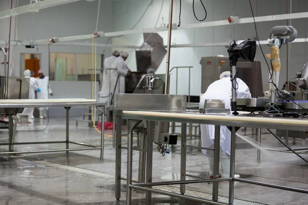 Butcher cleaning the floor — Stock Photo, Image