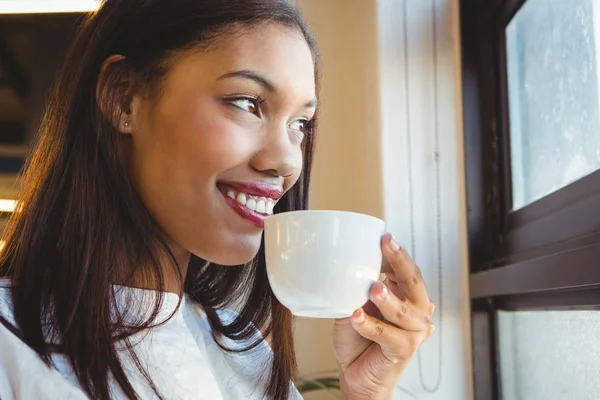 Smiling woman having cup of coffee — Stock Photo, Image