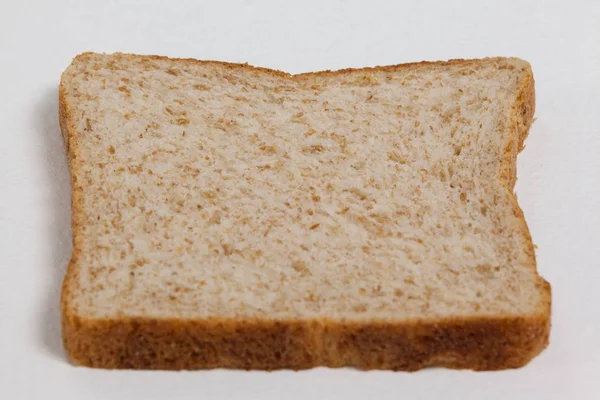 Primo piano di una fetta di pane — Foto Stock