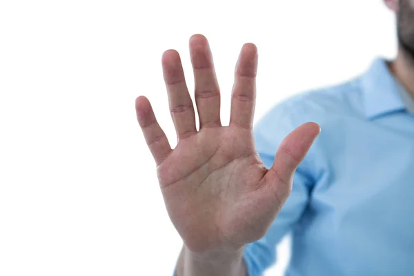 Hand of man pretending to touch an invisible screen — Stock Photo, Image
