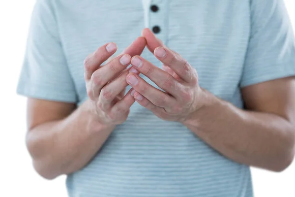 Homem fingindo segurar um objeto invisível — Fotografia de Stock