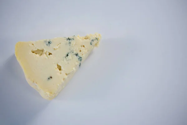 Piece of cheese on white background — Stock Photo, Image