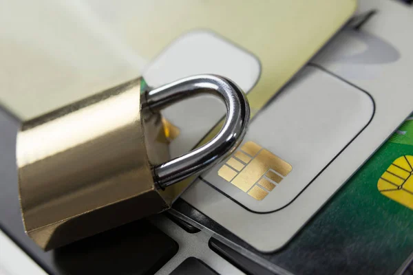 Metallic lock with smart card on laptop — Stock Photo, Image