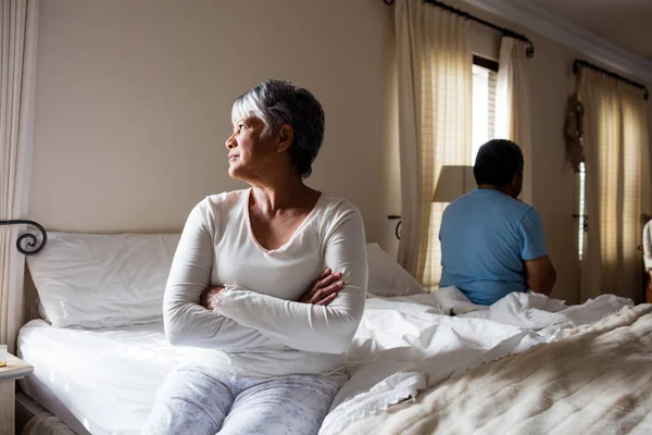 Upset senior couple ignoring each other — Stock Photo, Image