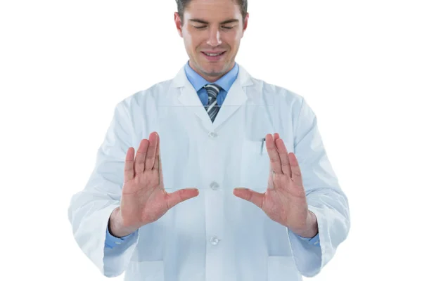 Smiling doctor gesturing — Stock Photo, Image