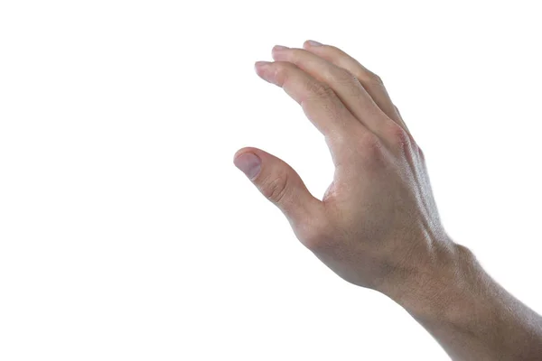 Mano del hombre fingiendo tocar una pantalla invisible — Foto de Stock