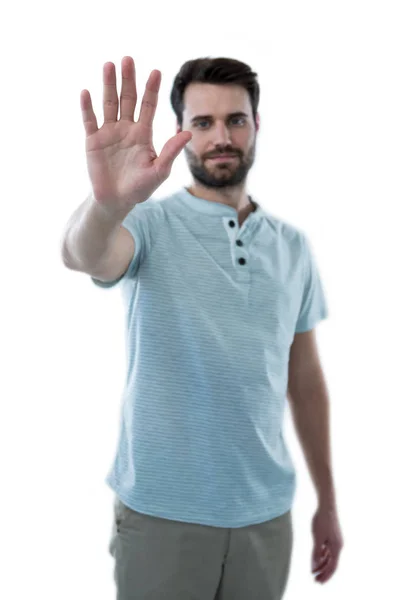 Hombre fingiendo tocar una pantalla invisible — Foto de Stock