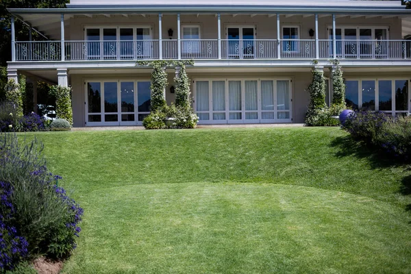 Exterior of a house with lawn — Stock Photo, Image