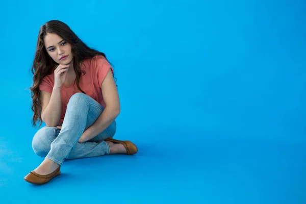 Beautiful woman sitting — Stock Photo, Image