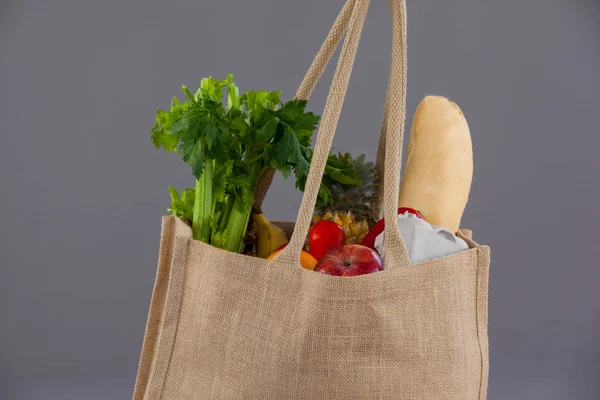 Vegetables and fruits in grocery bag — Stock Photo, Image
