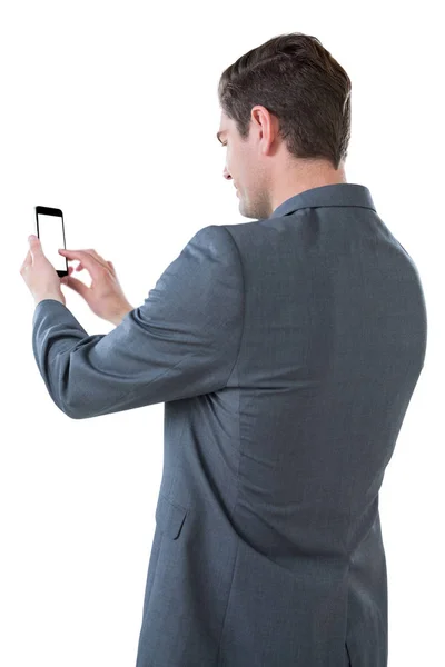 Hombre de negocios usando el teléfono móvil — Foto de Stock