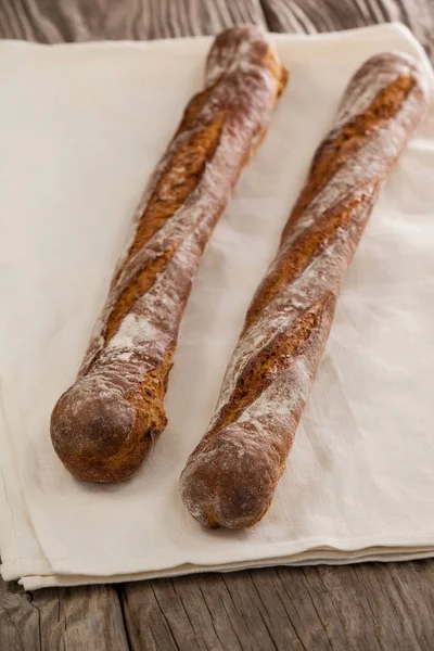 Two baguettes on napkin — Stock Photo, Image