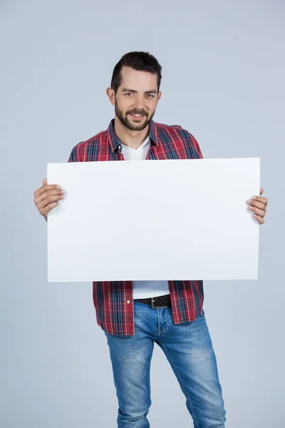 Άντρας με λευκή πινακίδα — Φωτογραφία Αρχείου