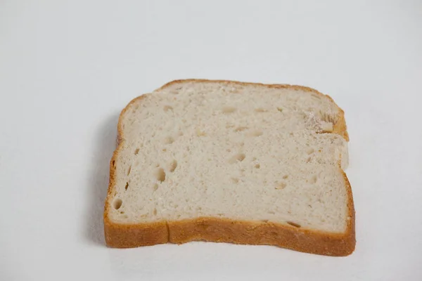 Close-up van een sneetje brood — Stockfoto