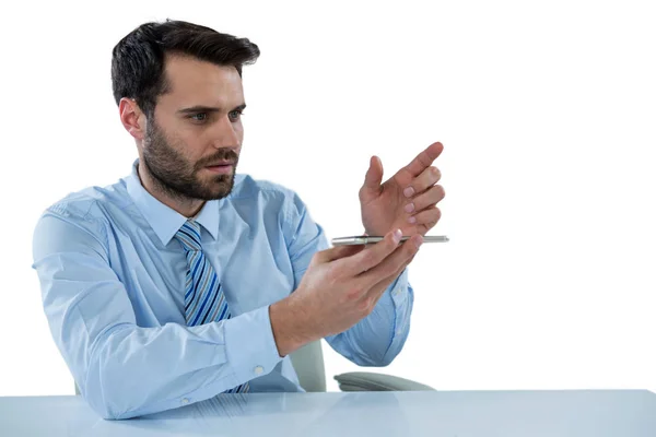 Businessman pretending to touch an invisible object — Stock Photo, Image
