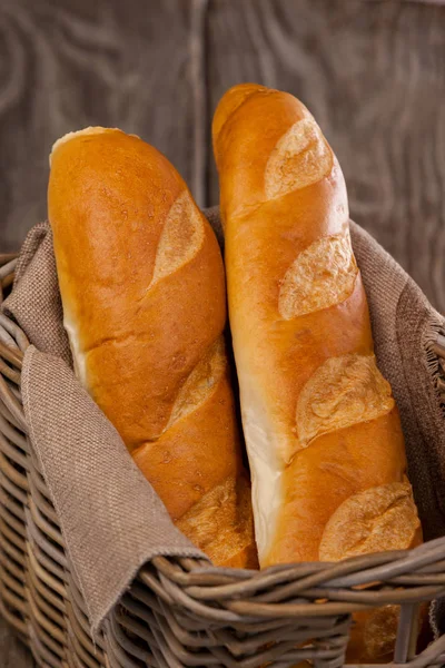 Baguettes in wicker basket — Stock Photo, Image