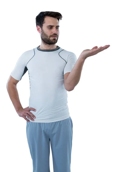 Man pretending to hold an invisible object — Stock Photo, Image